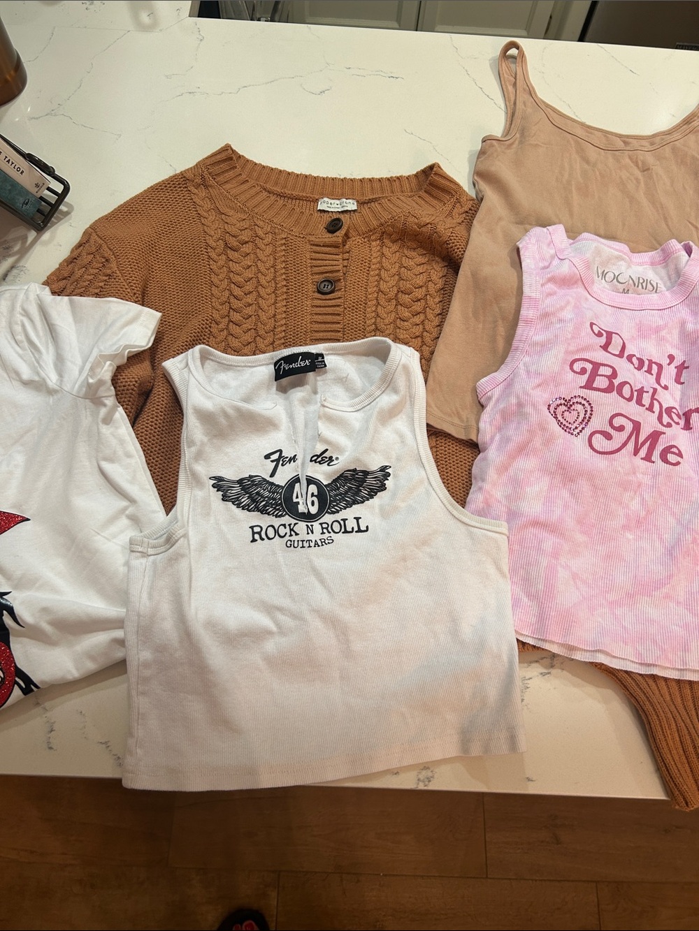(5) woman’s size Medium Tops